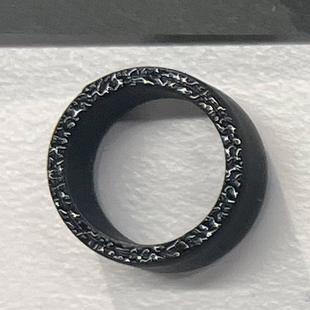 black cylinder with caldera